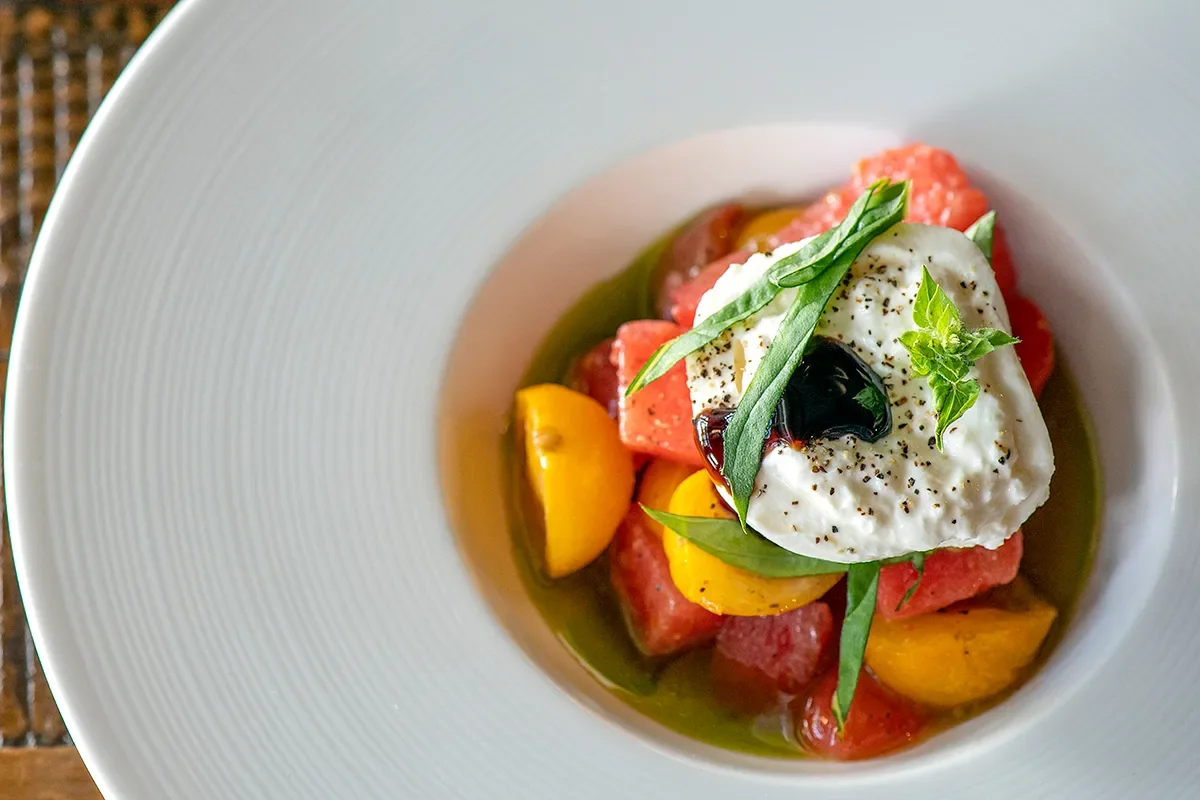 Tomates, burrata et pastèque — heirloom tomato, burrata, and watermelon salad