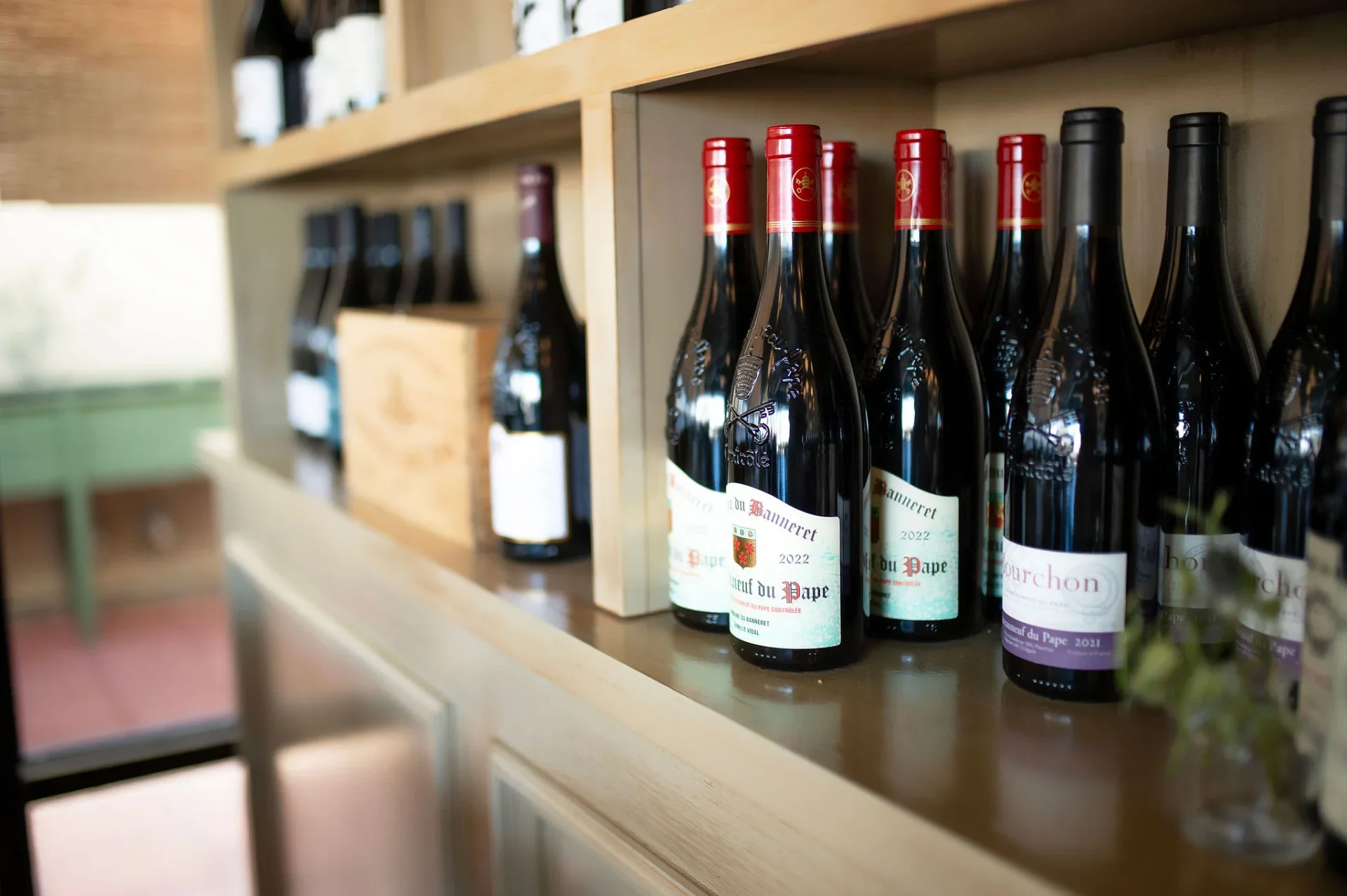 Châteauneuf-du-Pape and French red wines on the cellar shelf