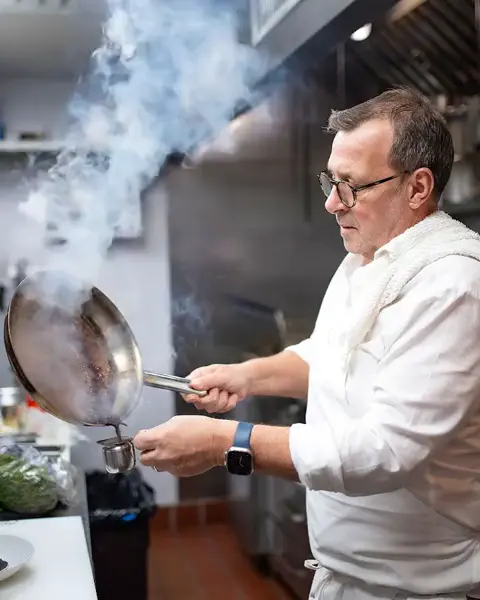 Chef David Denis at work in the kitchen